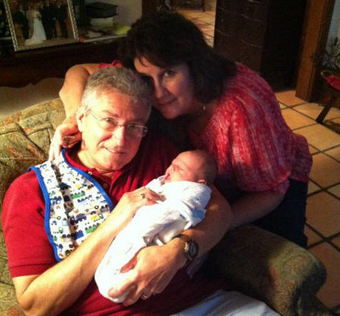 Jody Hopkins and Gary Barbin with grandbaby